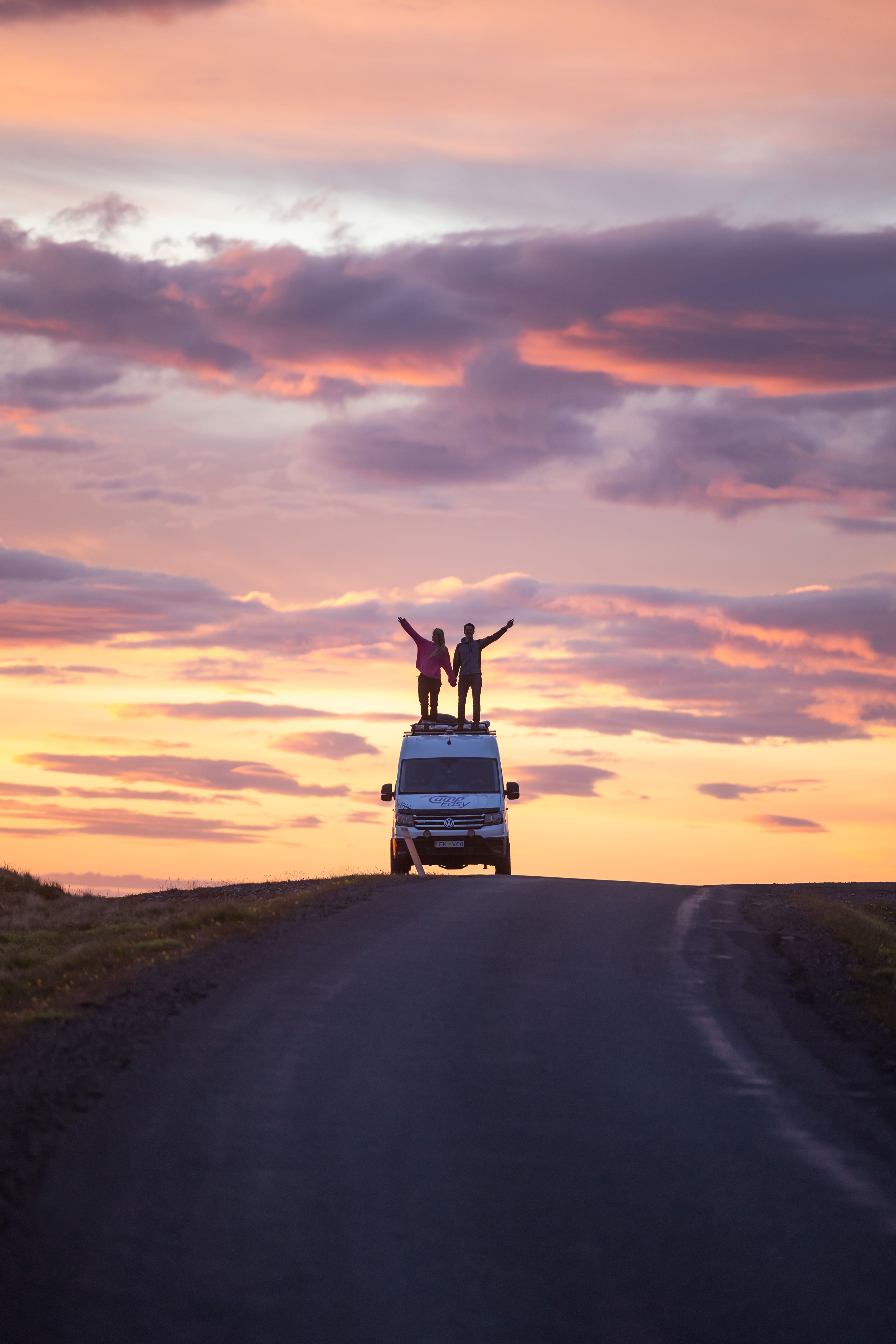 Woman next to the campervan