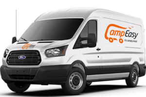 Ford campervan with branded logo on the front and side of the car